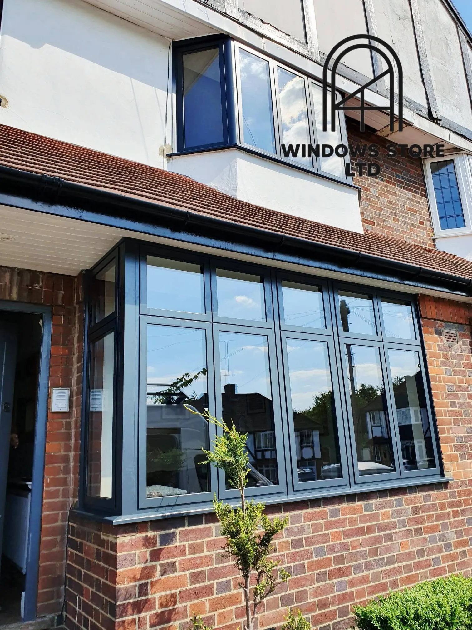 Large-pane aluminium picture window in a contemporary interior, London