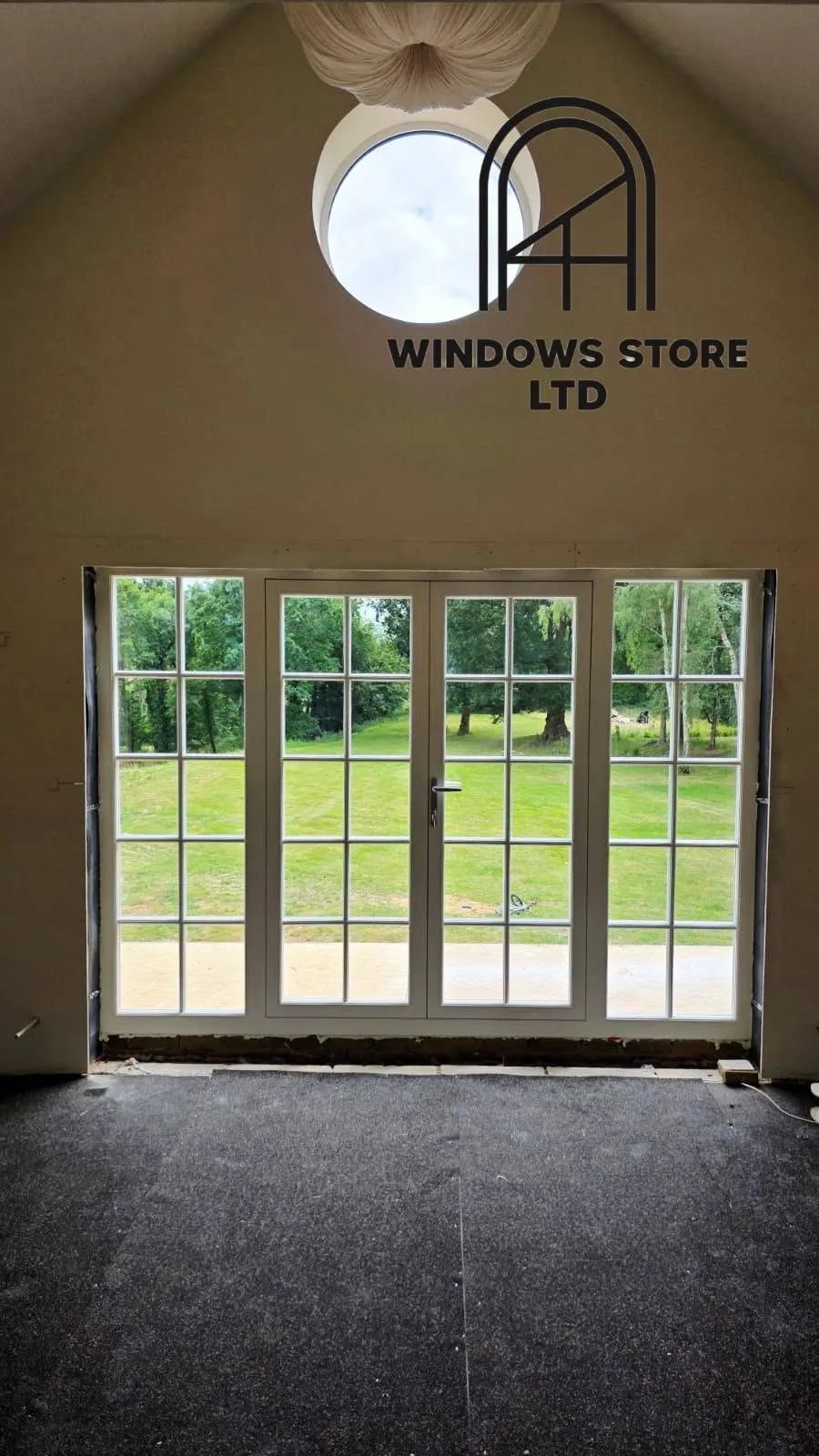 Timber French doors with glazing bars and side panels, London