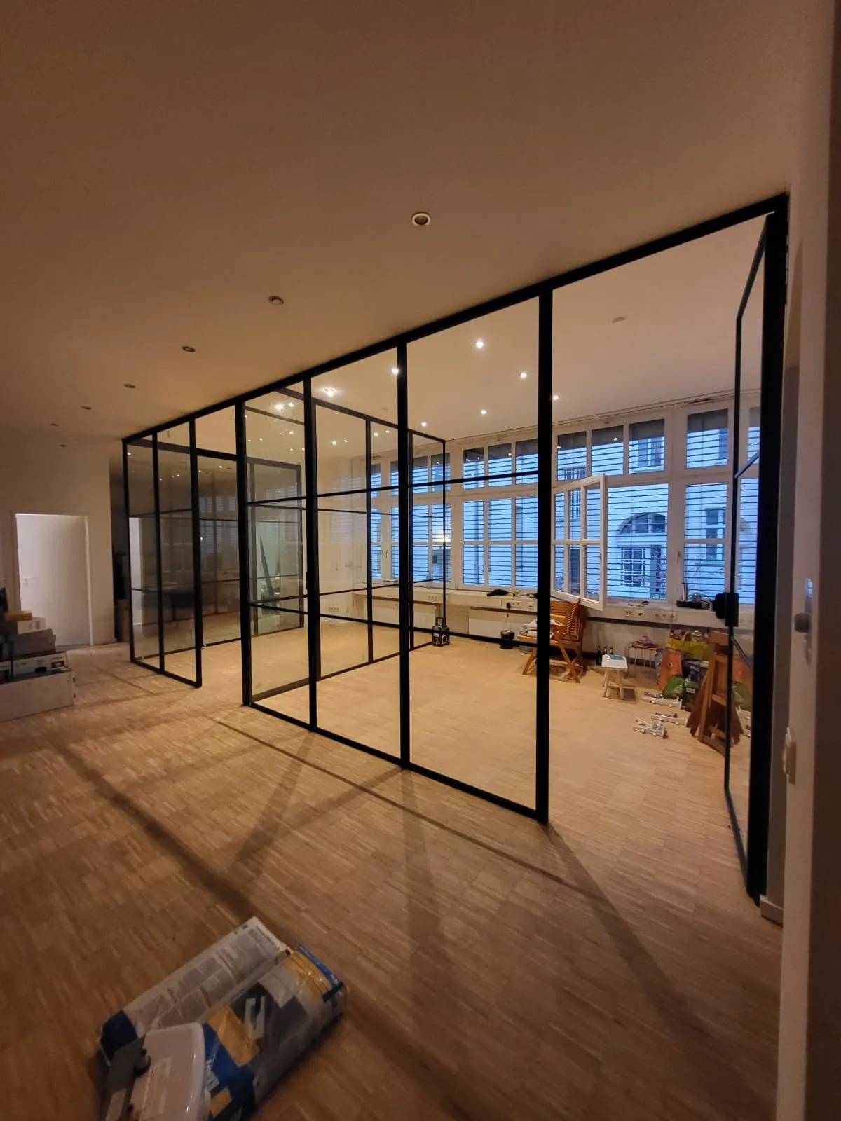 Structural glazing and roof lights on a rear extension, London
