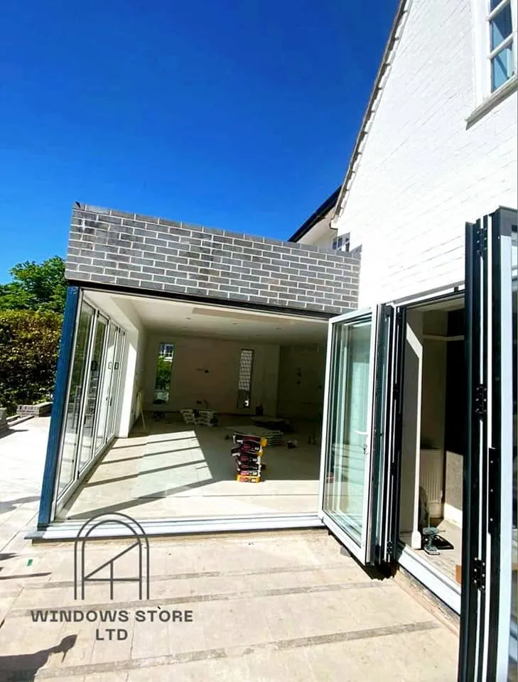 Glazed roof and walls on a rear extension, London