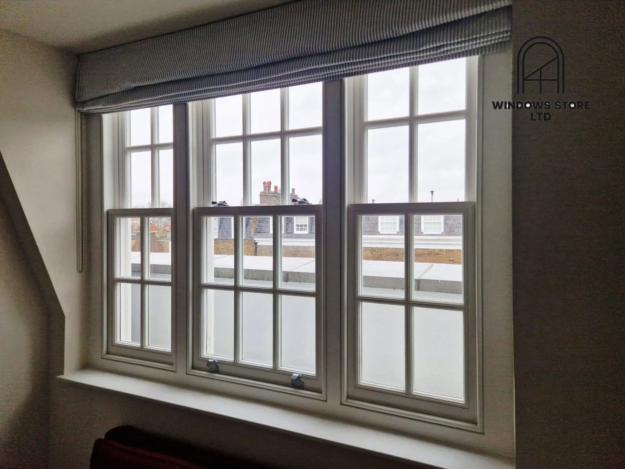 Timber sliding sash windows fitted in a London loft conversion