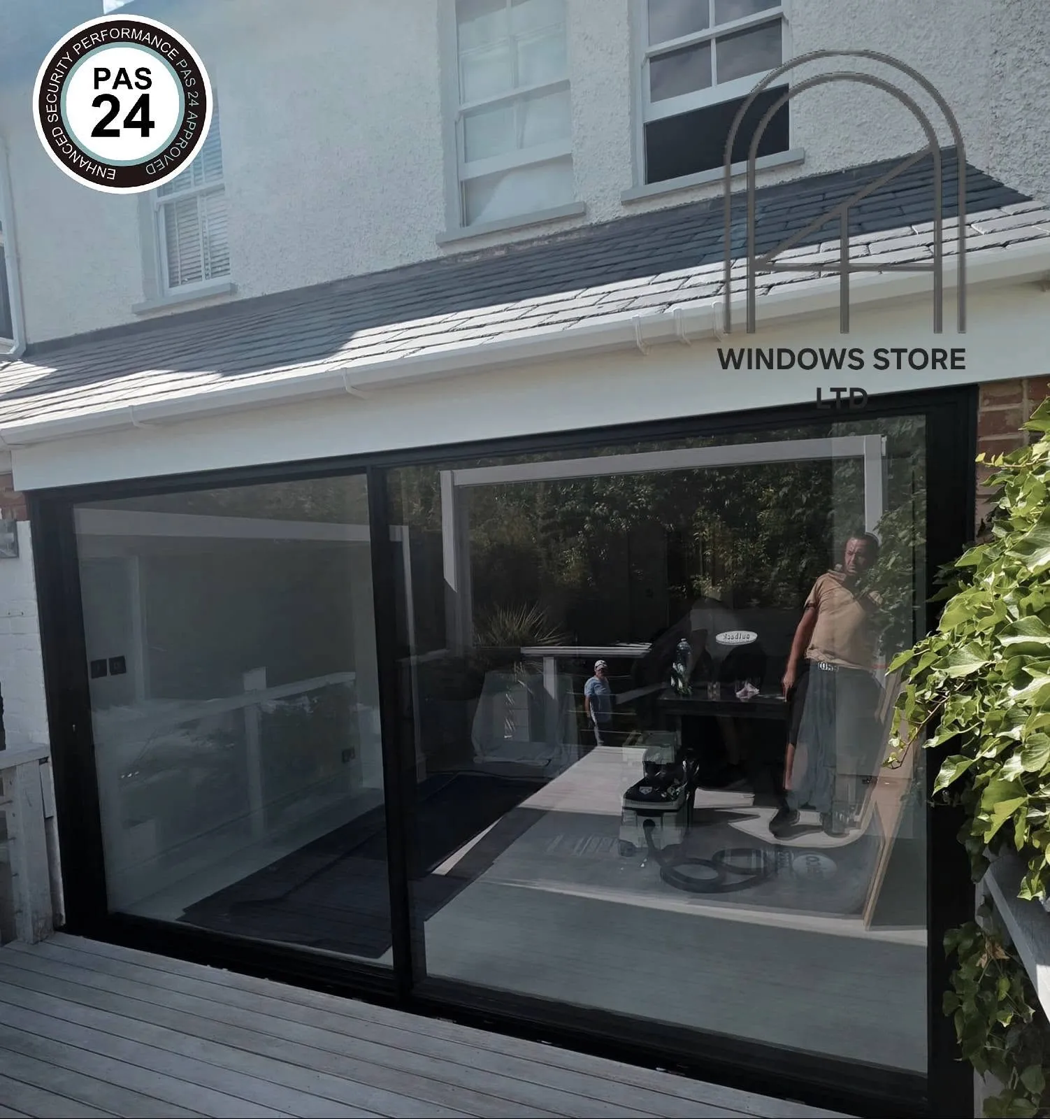 Slim sightline sliding doors onto a terrace, London