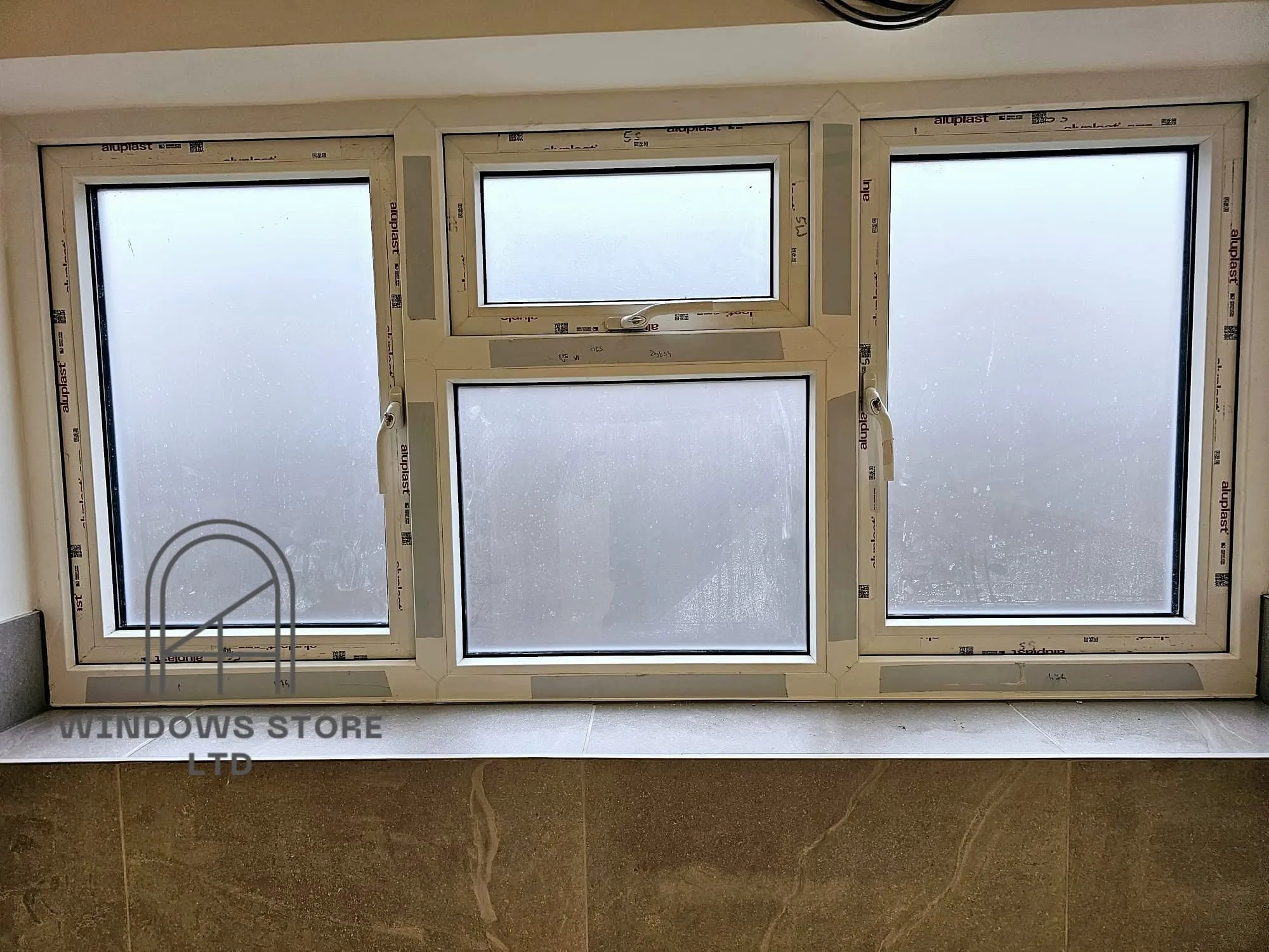 Aluminium tilt and turn window on an upper floor, London
